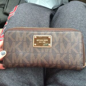 Michael Kors Brown Monogram Zip Wallet with Gold Plaque